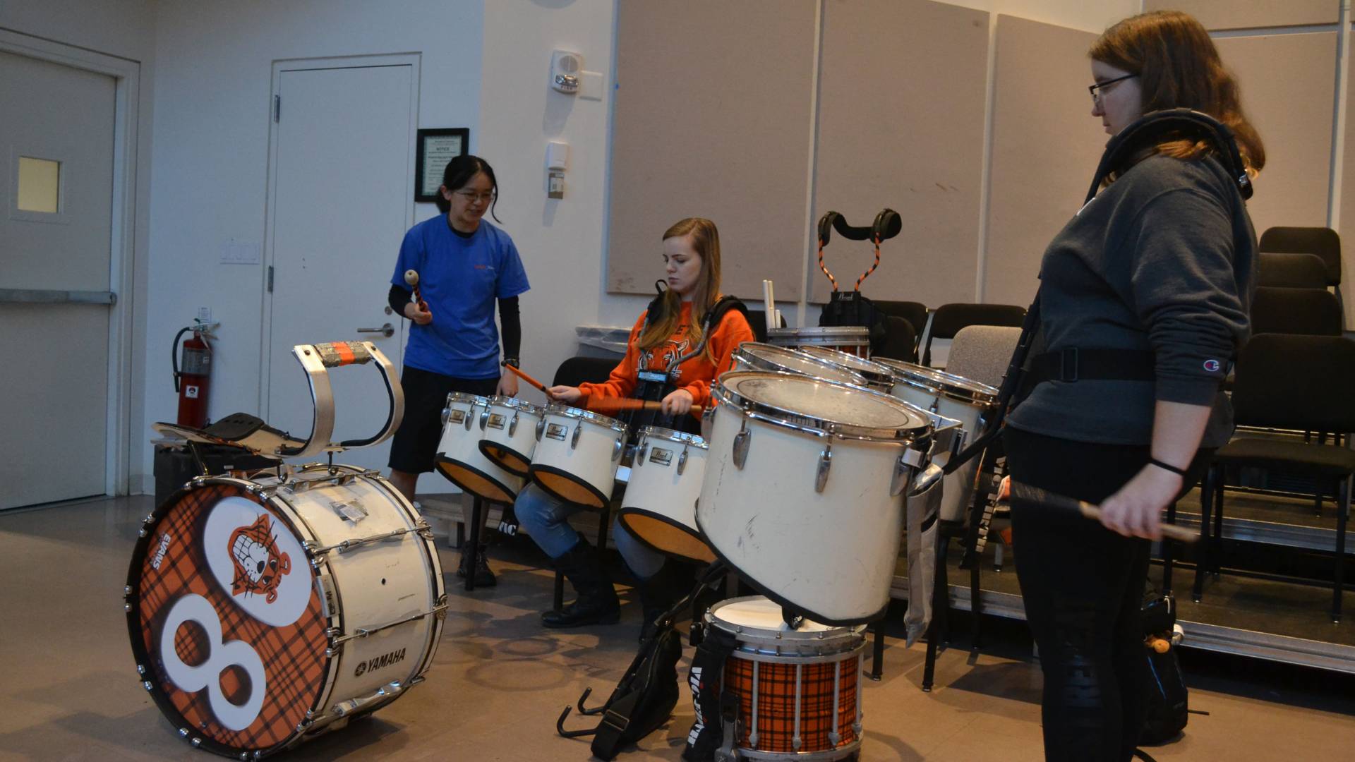 Students at the drums during Learn to Play an Instrument with the Band class