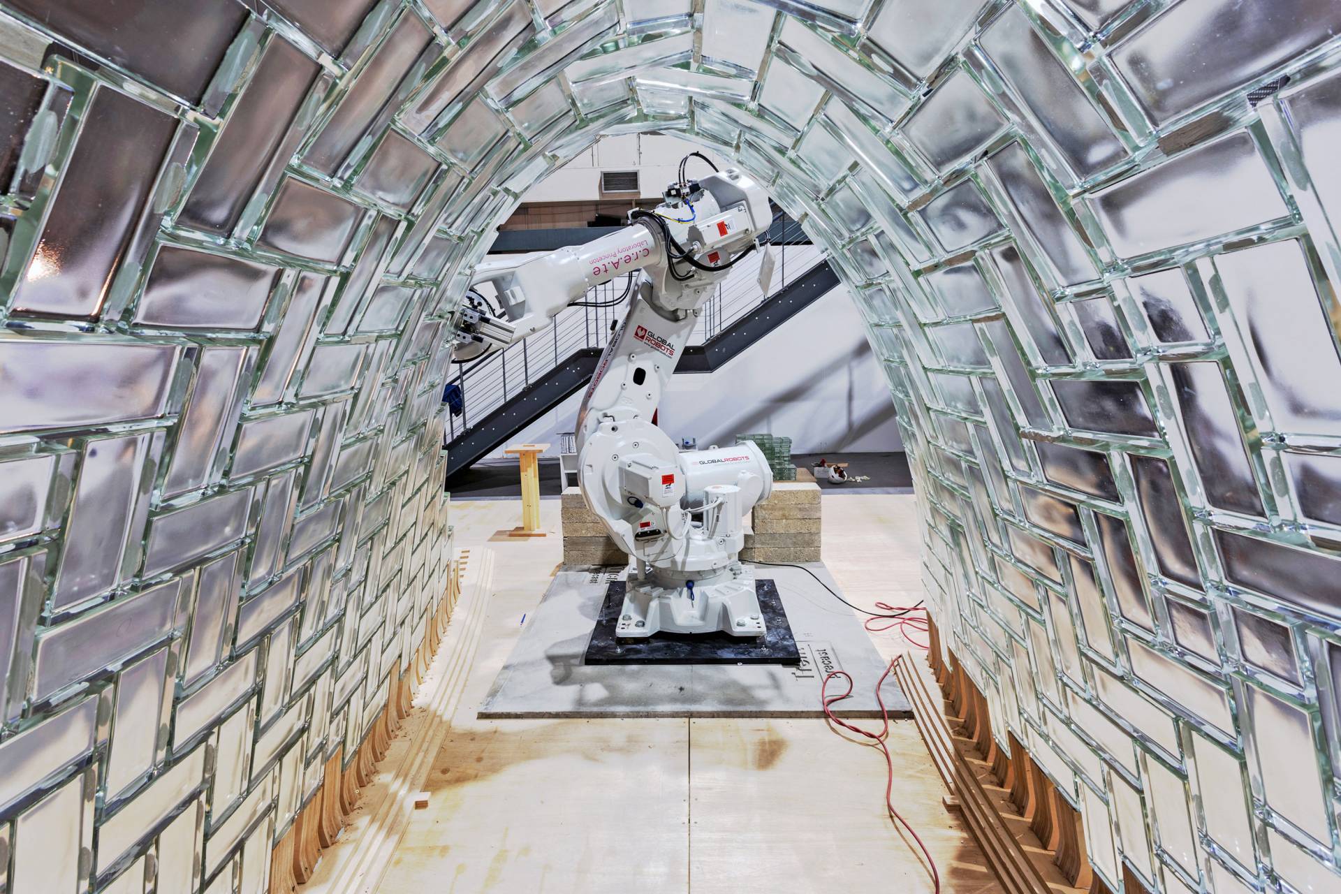 Robot building a glass tunnel