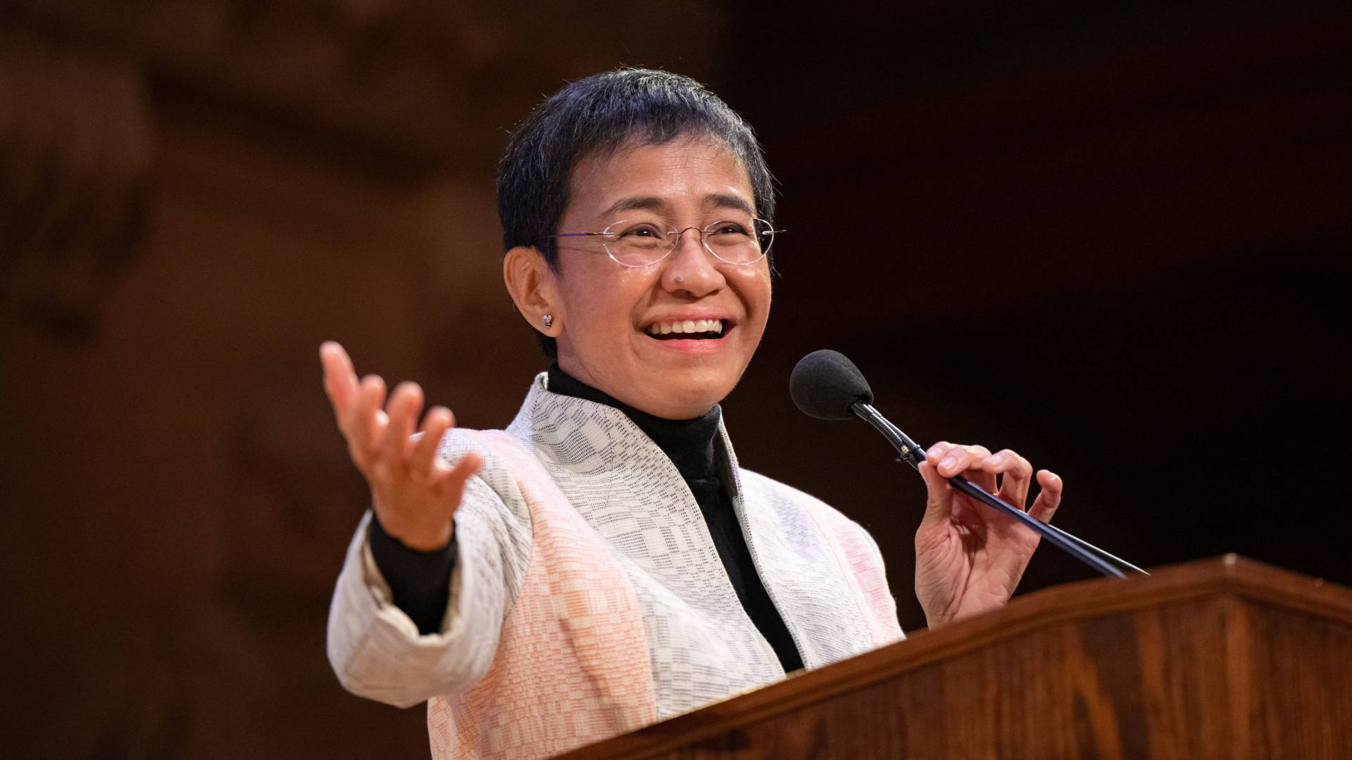 Maria Ressa at the podium at Richardson Hall